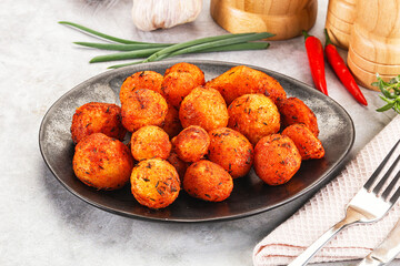 Baked young potato with paprika