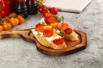 Bruschetta tapas with chorizo and tomato