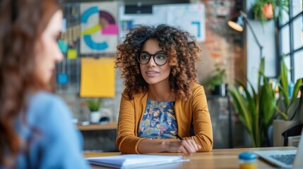Career Coaching Session in a Modern Office with a Young Professional