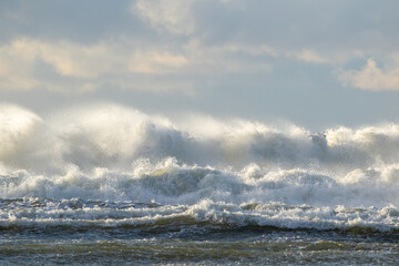 Extremely stormy sea and dramatic foamy waves at the coast of The Baltic Sea near Paldiski, Estonia, Northern Europe