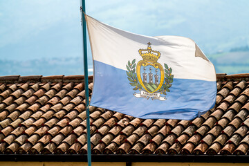 San Marino flag waving on wind © Andrzej