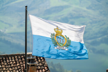 San Marino flag waving on wind © Andrzej