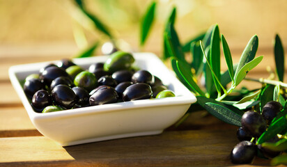 Farm olives on table in olive garden