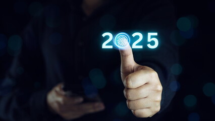 Businessman  Scan Finger 2025 business planning and strategy concept, Hand touching, Start new business and new life.happy new year by technology concept, Start new business and new life.