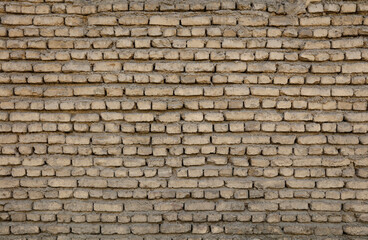 The old bricks are neatly arranged on top of each other. Old brick texture