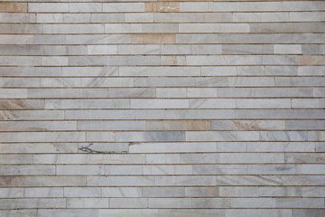 Old stone marble wall. Brick arrangement. Marble wall texture