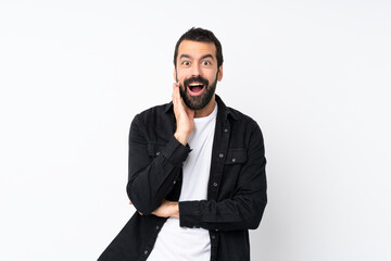 Young man with beard over isolated white background with surprise and shocked facial expression