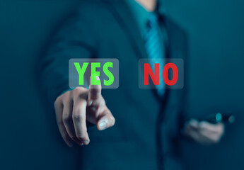 Businessman presents right and wrong icons for decision making yes or no. Concept of displaying right and wrong symbols, decision making, voting, communication of choices and expertise.
