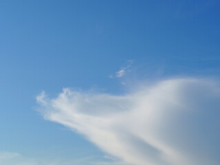 Thin clouds floating in the sky. Elegant empty blue background. Sky Blue and white cloud, Horizon Spring, Clear Sky. The natural beauty of the sky
