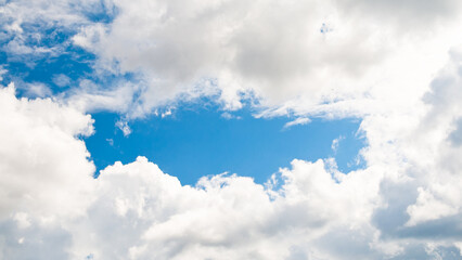 The photo shows blue sky and clouds
