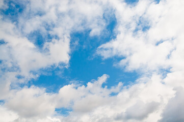 The photo shows blue sky and clouds