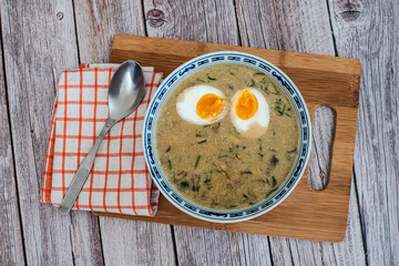 Traditional Czech Creamy Mushroom Soup Kulajda with Egg, Potatoes, and Dill