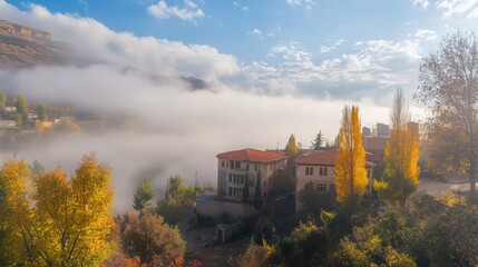 Naklejka premium Autumn scene with misty fog colorful forest sunrise