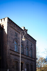 A beautiful red brick Gothic building. Ancient architecture. Living space.