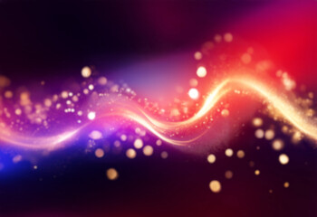 Obraz premium A golden wavy stream of sparkling particles on a black background.