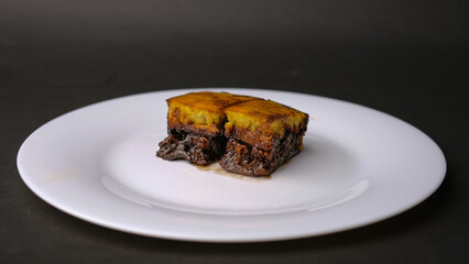 Sweet martabak terang bulan, chocolate peanut pancakes on a white plate