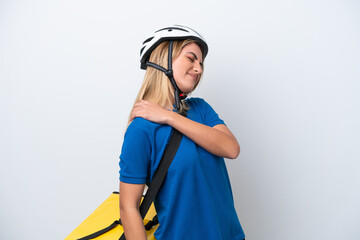 Young caucasian woman with thermal backpack isolated on white background suffering from pain in shoulder for having made an effort