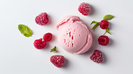Fresh raspberry ice cream scoop surrounded by ripe raspberries and mint leaves on a white background