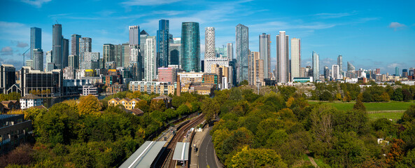 Panoramic aerial image of Canary wharf skyline from Mudchute park in Autumn. 