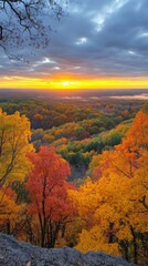 Fototapeta premium Stunning autumn forest with golden and orange trees on a mountain slope