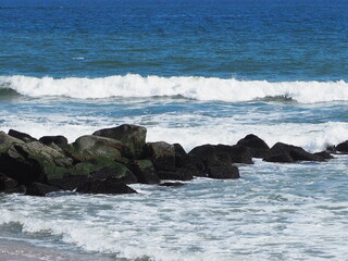 waves crashing on rocks