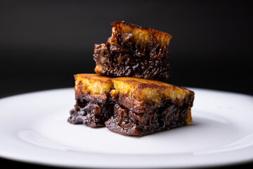 3 pieces of sweet martabak on a white plate, indonesian street food