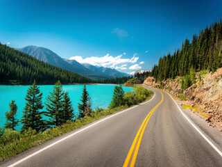 road by tranquil waters