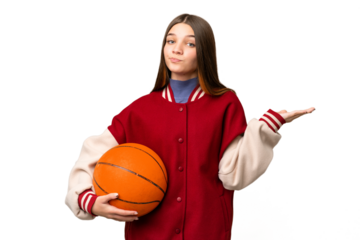 Teenager girl playing basketball over isolated chroma key background having doubts while raising hands