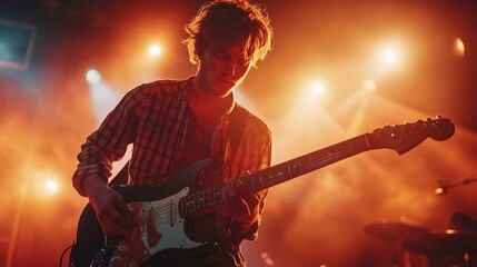 Rock guitarist performing on stage with lights and energy