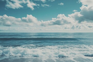 Obraz premium A person standing on a surfboard in the ocean, enjoying the ride
