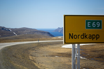 Norwegian fjord, with bright blue sky and the typical mountains of the North Cape 