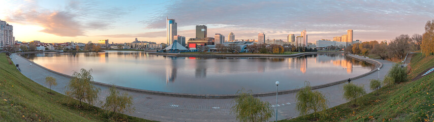 dawn in autumn in the center of Minsk by the river. Belarus