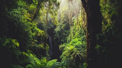 Fototapeta premium Lush Jungle Landscape with Towering Trees and Waterfall