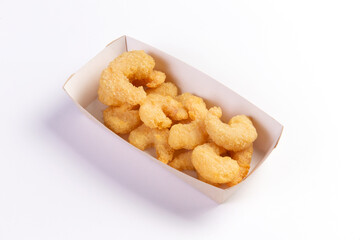 Delicious fried shrimp on a white background.