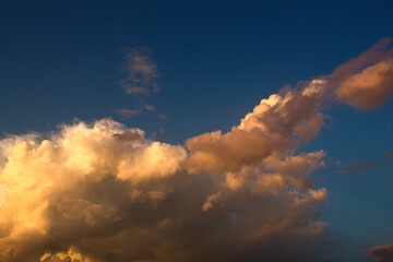 Fototapeta premium Cloudy colorful spectacle during sunset