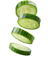 Fresh cucumber slices falling on transparent background