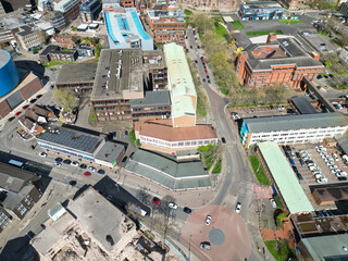 Fototapeta premium Aerial View of Downtown Buildings at Central Coventry City Centre of England United Kingdom. Drone's Camera Footage Was Captured During Bright Sunny Day From Medium High Altitude on March 30th, 2024