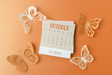October 2025 calendar card with butterfly paper.