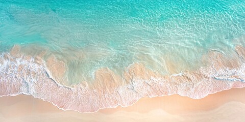 Obraz premium Aerial view of a tranquil beach featuring crystal-clear turquoise water gently lapping against soft, sandy shores, creating a serene coastal scene.