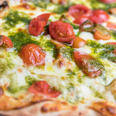 Italian pizza with cherry tomatoes