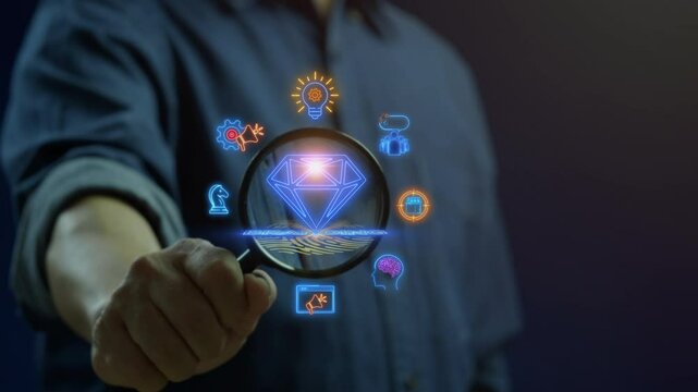Businessman shows glowing neon line of BRAND concept with icons of innovation, advertising, customer, target market, strategy, marketing and awareness on virtual screen.