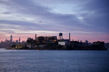 Alcatraz prison back lit against the sunrise
