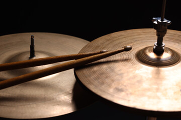 Obraz premium Different drums on a black background, percussion musical instruments