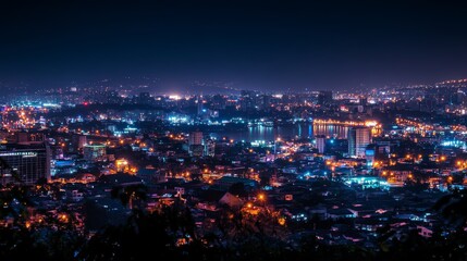 Obraz premium Vibrant Nighttime Cityscape: An Energetic Adventure Awaits in a People-Free Urban Landscape.