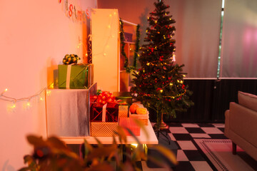 The festive Christmas party scene showcases a variety of beautifully wrapped gift boxes in different sizes and colors, arranged neatly on a table in the cozy, warmly lit living room.