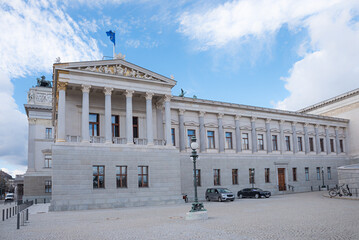 house of parliament building with colonnade in Vienna and european flag