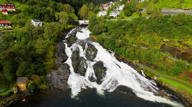 Hellesylt, Norway, a waterfall near the town, drone shot, aerial video