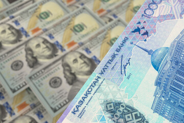 Banknotes of Kazakhstani tenge and US dollar. Cash. Financial concept.