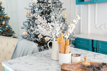 Festive kitchen setting with holiday decorations and baking essentials