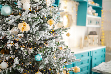 Beautifully decorated Christmas tree with ornaments in a cozy holiday setting